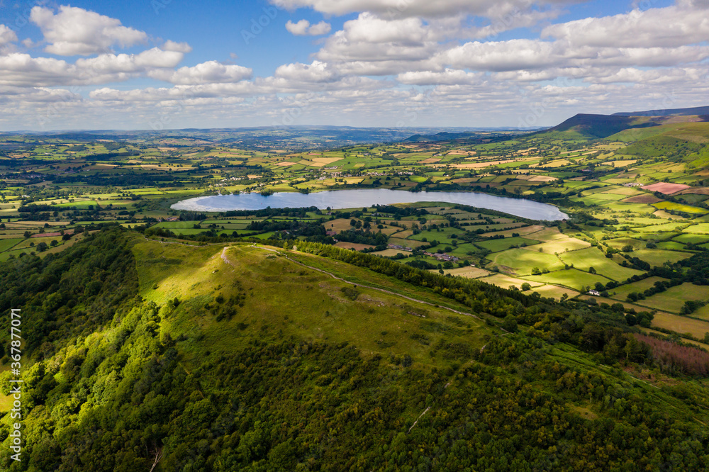Aerial view of an old hillfort and lake