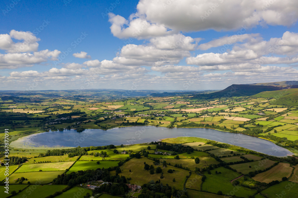 Aerial view of a lake and farmland