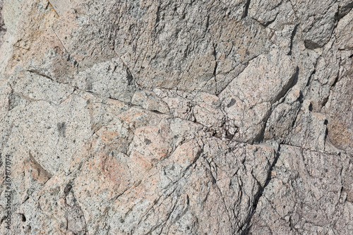 灰色系の岩石の表面 