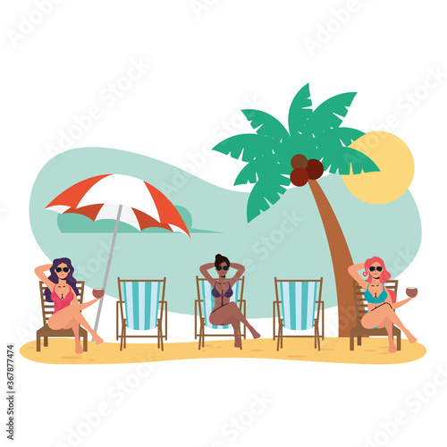 interracial women on the beach practicing social distance