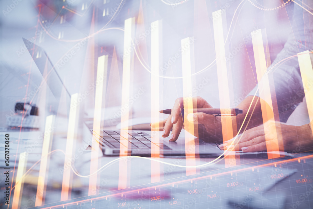 Double exposure of woman hands typing on computer and forex chart hologram drawing. Stock market invest concept. Double exposure of woman hands typing on computer and forex chart hologram drawing. Stock market invest concept.
