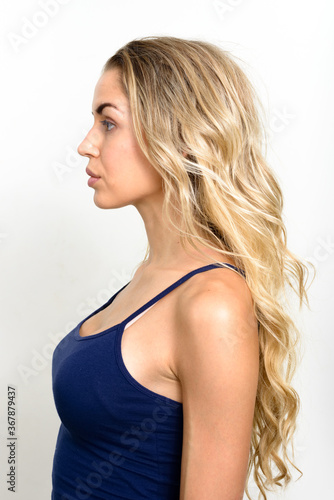 Portrait of young beautiful woman with blonde hair