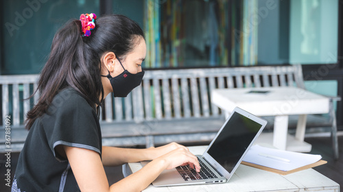 young women working busines...