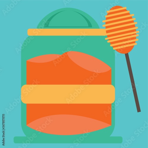 bottle of honey with dipper