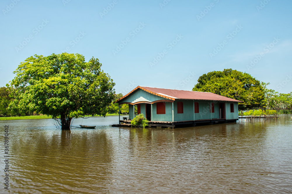 Obraz premium house on the river