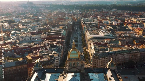 Prague drone shot of Wenceslas Square and National Museum, cinematic panorama view of Czech Republic capital city photo