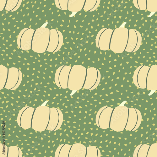 Autumn food pumpkin doodle seamless pattern. Green background with dots and light vegetable elements.