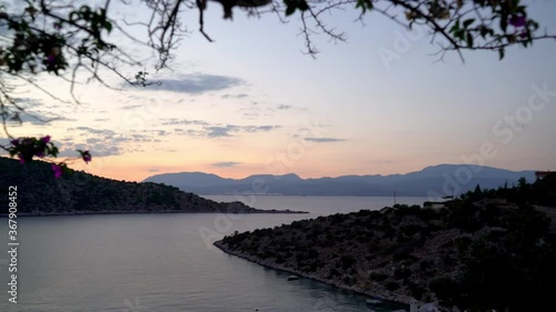 Panoramic view of Fragolimano bay, located at Corinth, Peloponnese, Greece. Pan wide shot, with trees in the foreground photo