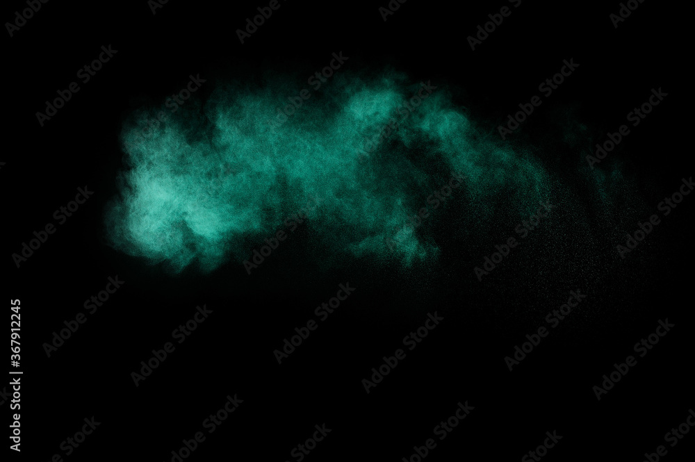 Aquamarine powder explosion on black background. Colored powder cloud. Colorful dust explode. Paint Holi. Aquamarine powder explosion on black background. Colored powder cloud. Colorful dust explode. Paint Holi.