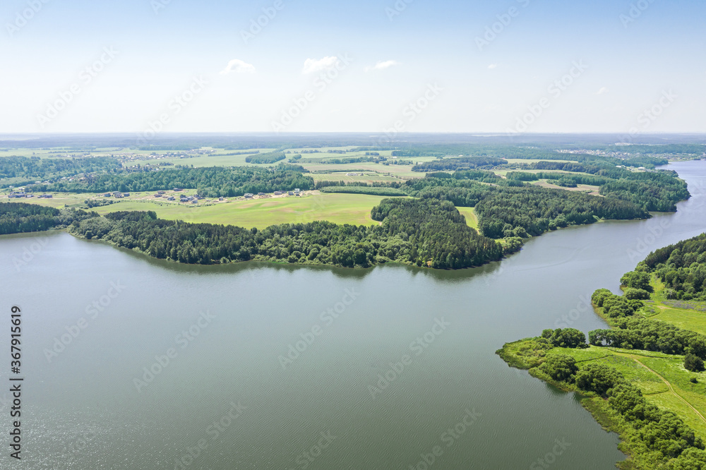 aerial view of summer countryside landscape. Lake Dubrovskoe, Minsk region, Belarus.