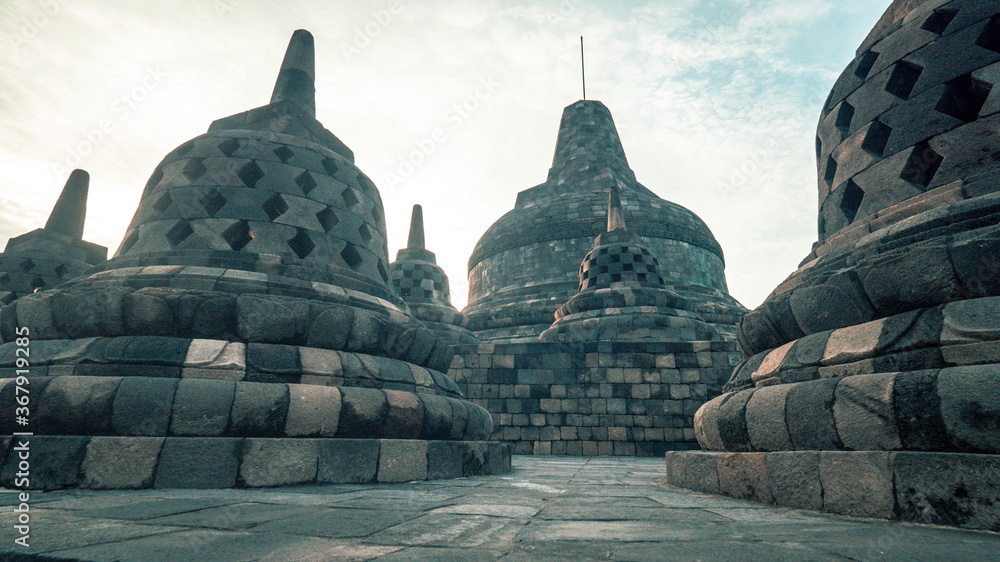 Borodobur Temple Exploration in Indonesia. Shot in the early morning. Borodobur Temple Exploration in Indonesia. Shot in the early morning.