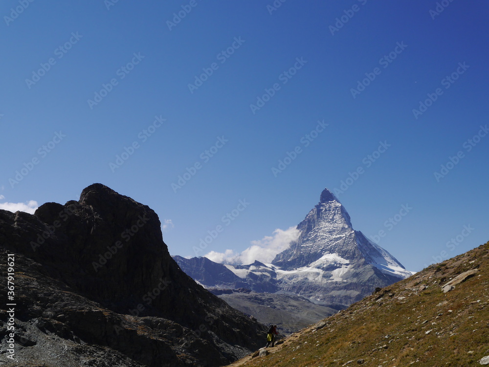 Obraz premium A picture of a tourist trail touring the beautiful nature trekking route of Matterhorn mountain nature tour in Switzerland, August 15, 2015.