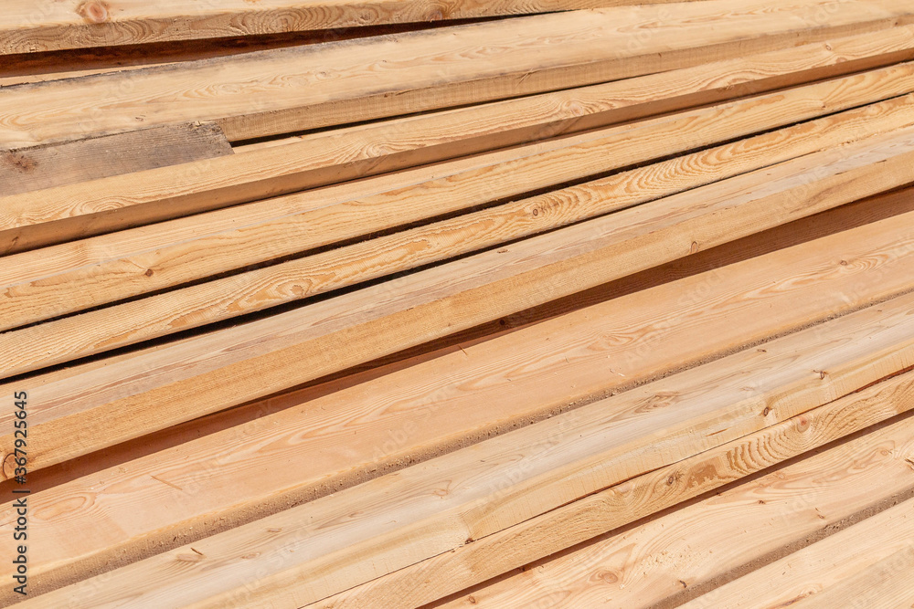 Stack of fresh construction boards or bars Stack of fresh construction boards or bars