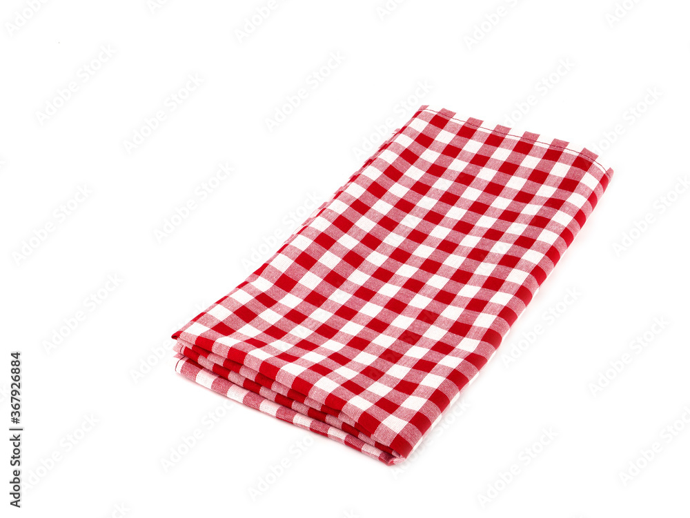 Closeup of red and white checkered fabric or napkin isolated on white background. Concept kitchen utensils and tableware.. Closeup of red and white checkered fabric or napkin isolated on white background. Concept kitchen utensils and tableware..