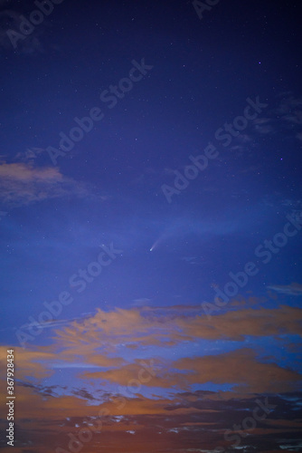 Neowise Comet ( C/2020 F3 )in cloudy  night sky at  , grain image