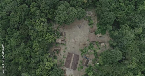 Amazon Jungle with indigenous tribe aerial shot photo