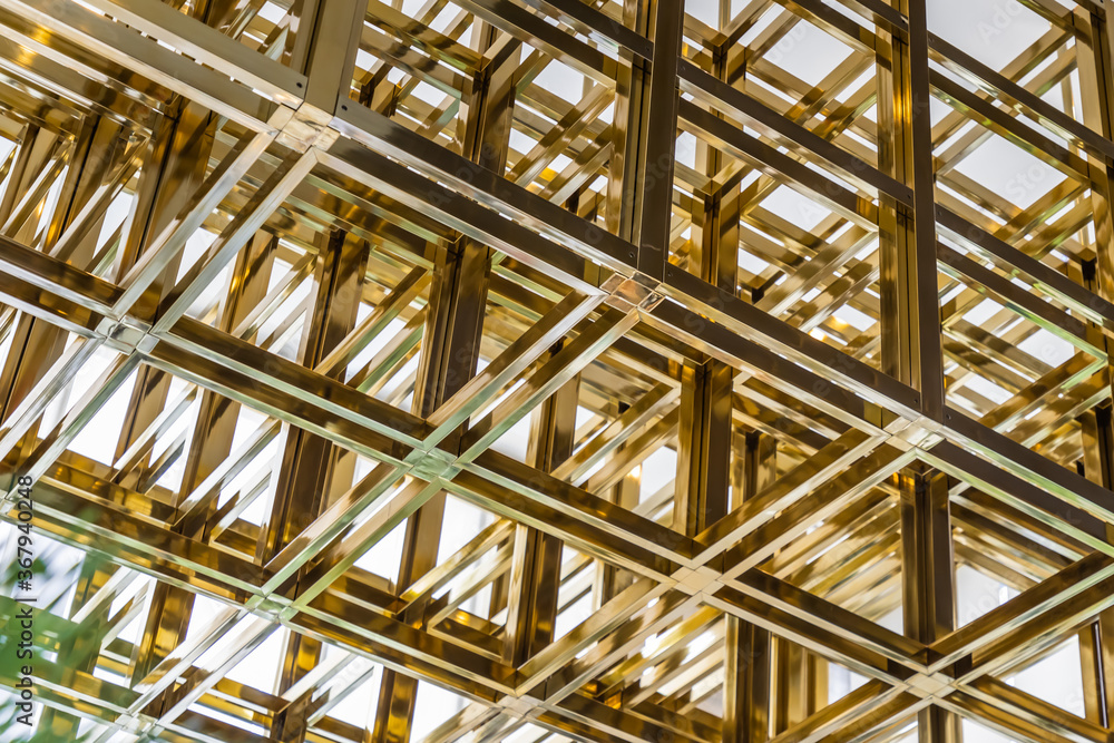 Modern design with Square pattern and geometric structure of ceiling decoration, Part of a modern ceiling. Selective focus. Modern design with Square pattern and geometric structure of ceiling decoration, Part of a modern ceiling. Selective focus.
