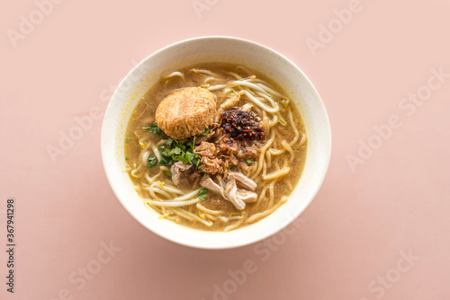 shredded chicken mee soto with a begedil 