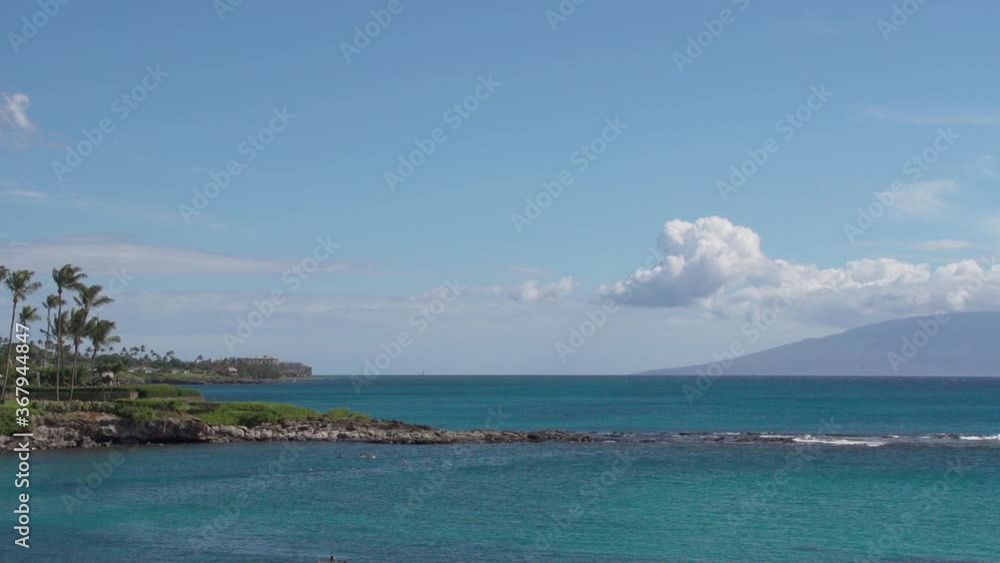 Tropical Hawaiian point. Crystal clear blue water on the west side of Maui Hawaii. Lush and beautiful. Tropical Hawaiian point. Crystal clear blue water on the west side of Maui Hawaii. Lush and beautiful.