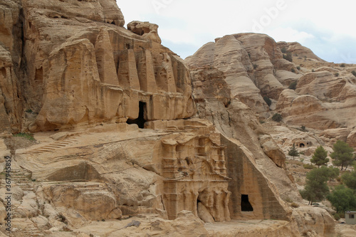 Obelisk tomb in ancient Petra city in Jordan. The building is carved out of sandstone right into the rock. Theme of travel in Jordan.