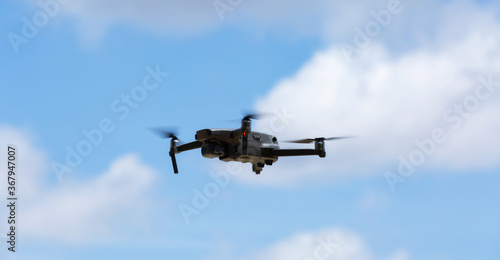 A flying drone armed with camera