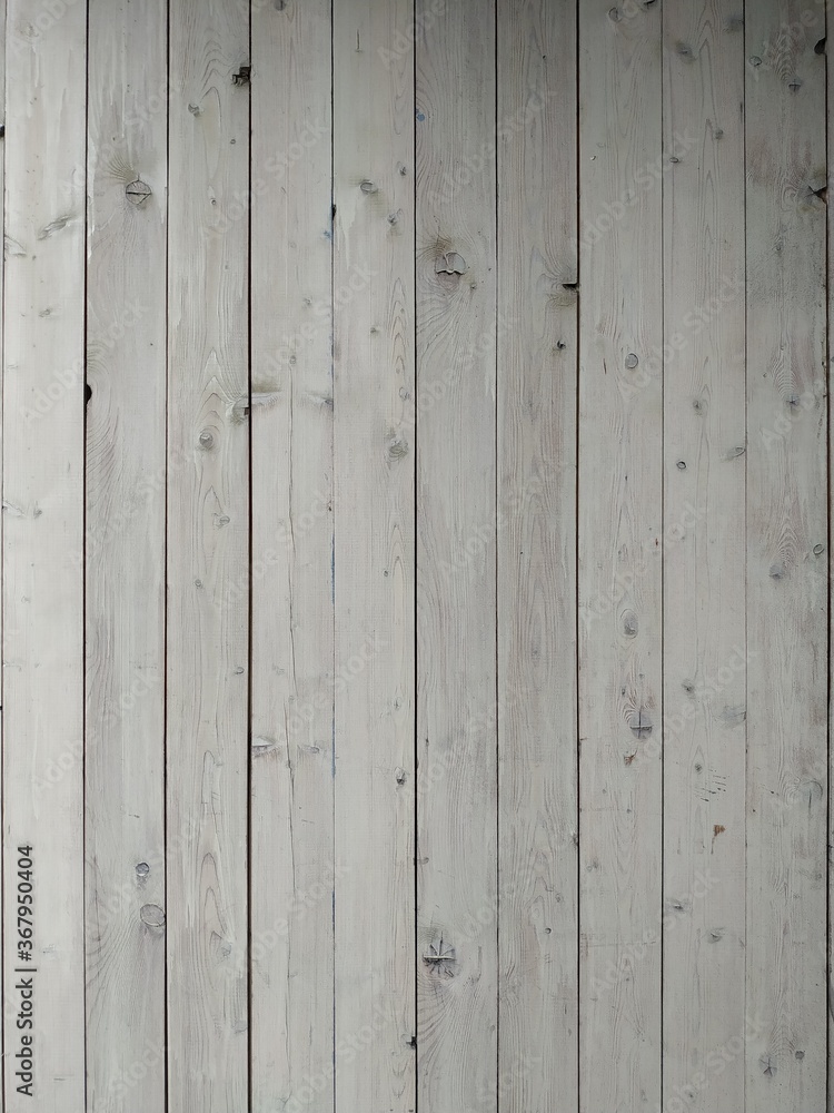 Fototapeta premium A surface of white worn out wooden boards in horizontal position. for vintage backgrounds
