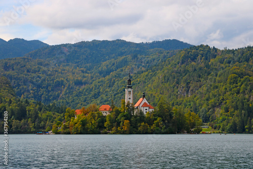Wallpaper Mural Beautiful view of Lake Bled with the Pilgrimage Church of the Assumption of Maria on a small island and Bled Castle. Torontodigital.ca
