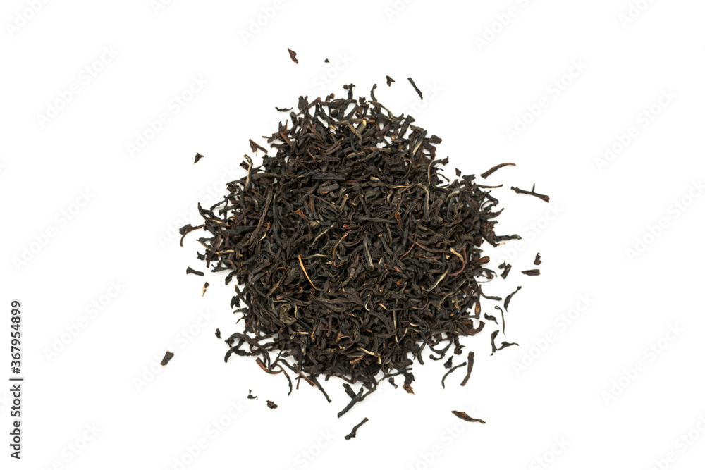 Leaves of black premium dry tea on a white background Leaves of black premium dry tea on a white background