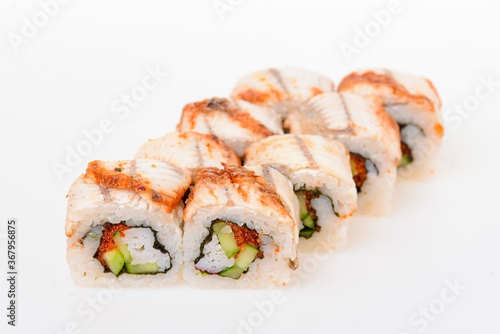 Eight sushi fresh maki rolls, isolated on white. Set of maki rolls with philadelphia cheese. Japanese cuisine.