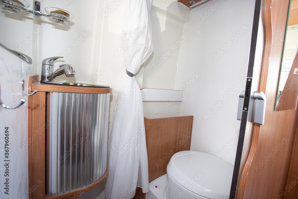 vacation campervan interior bathroom wc wooden in modern new motor home toilet - obrazy, fototapety, plakaty 