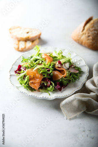 Healthy green salad with smoked salmon