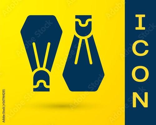 Blue Rubber flippers for swimming icon isolated on yellow background. Diving equipment. Extreme sport. Sport equipment. Vector.