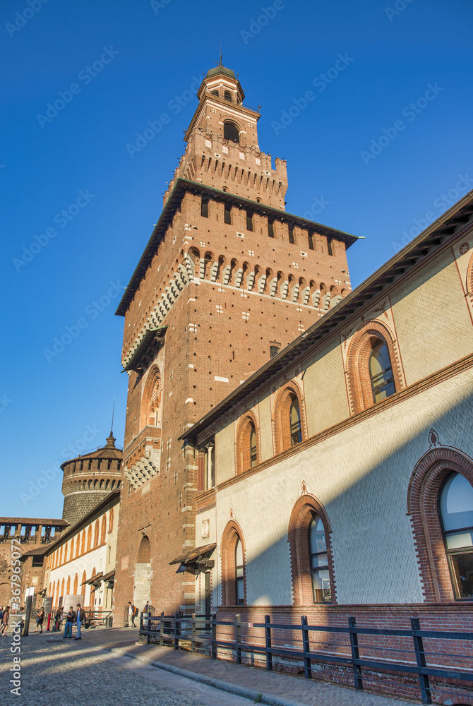 MILAN, ITALY - SEPTEMBER 2015: Tourists visit Sforza Castle and Park in summer season