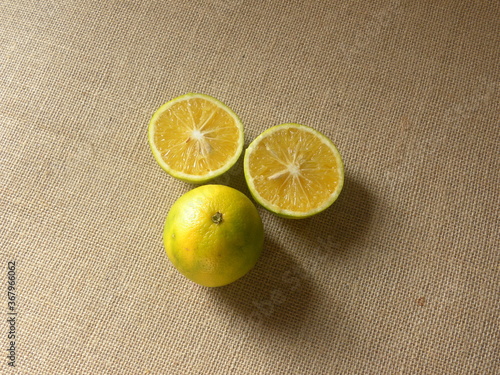 Yellow and green color whole ripe Sweet lime fruits or Citrus limetta photo