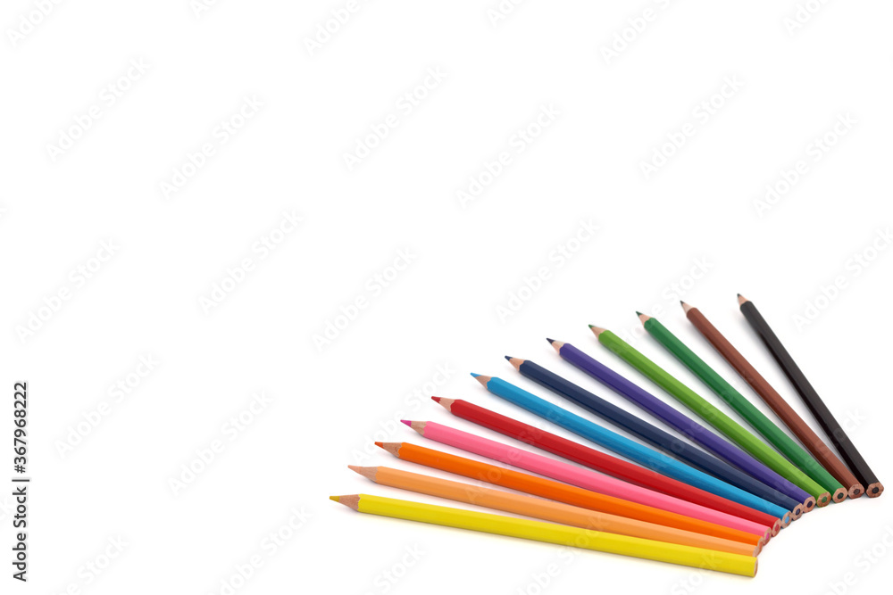 Multi-colored pencils isolated on a white background. Banner on the site, copy space. Multi-colored pencils isolated on a white background. Banner on the site, copy space.