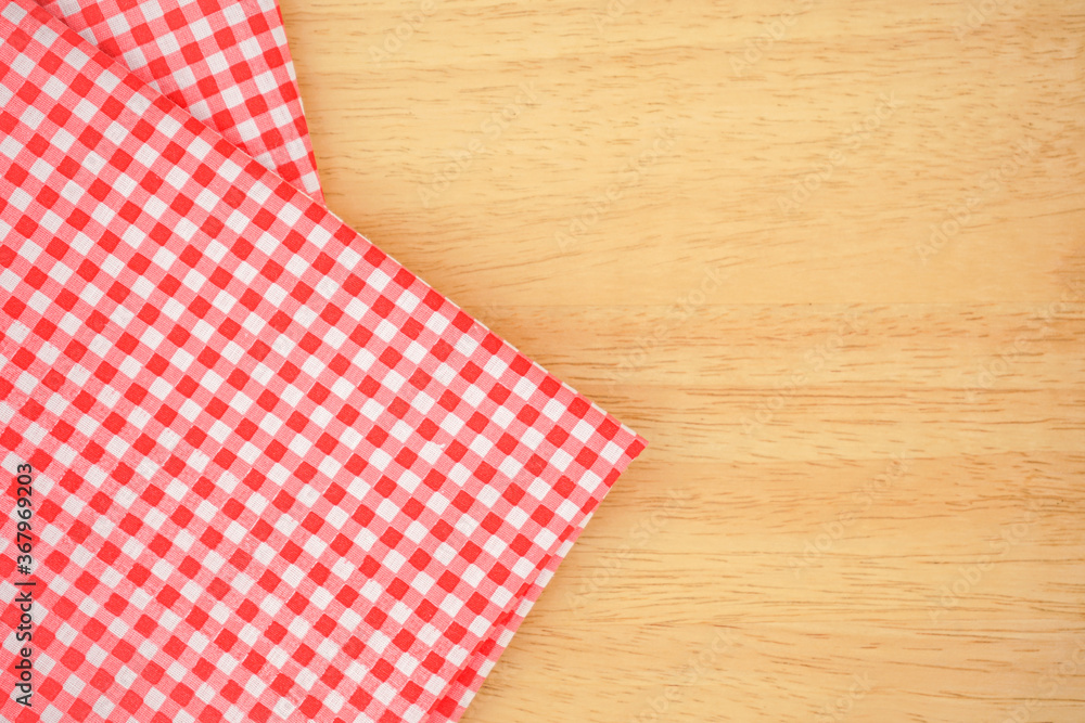 Classic pink plaid fabric or tablecloth
fold on wood desk with copy space Classic pink plaid fabric or tablecloth
fold on wood desk with copy space