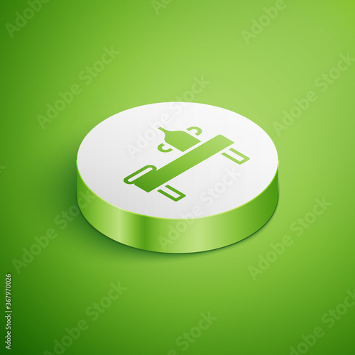 Isometric Massage table with oil icon isolated on green background. White circle button. Vector.