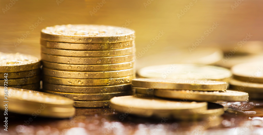 Gold money coin stacks, COVID-19 pandemic financial stimulus aid package concept, web banner Gold money coin stacks, COVID-19 pandemic financial stimulus aid package concept, web banner