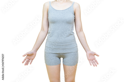 The body of a woman in gray clothes , Front view.Health-care concept on white background