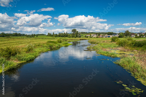 Obraz na płótnie View on the Liwiec river at sunny day near Mokobody, Masovia, Poland w salonie