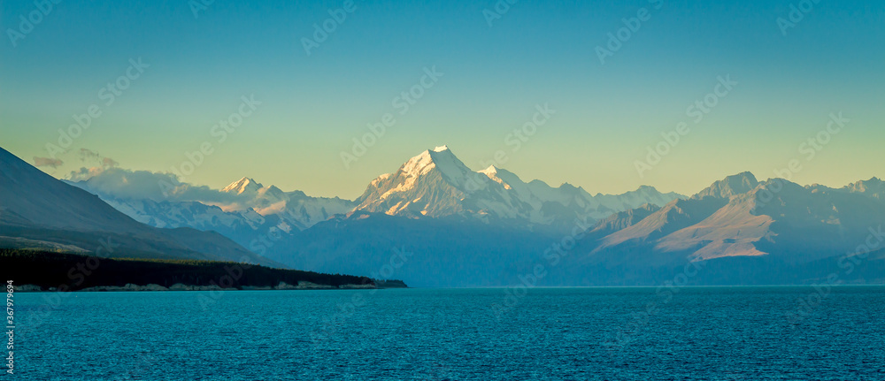A view of Mount Cook at sunset from the shore at Lake Pukaki