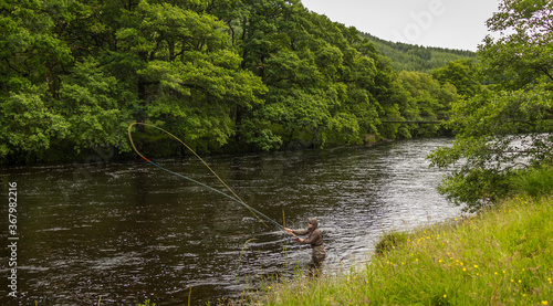 An fisherman salmon fly fishing on the River Orchy, Argyll, Scotland