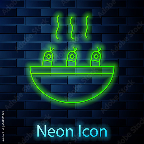 Glowing neon line Soup with shrimps icon isolated on brick wall background. Tom yum kung soup. Vector..