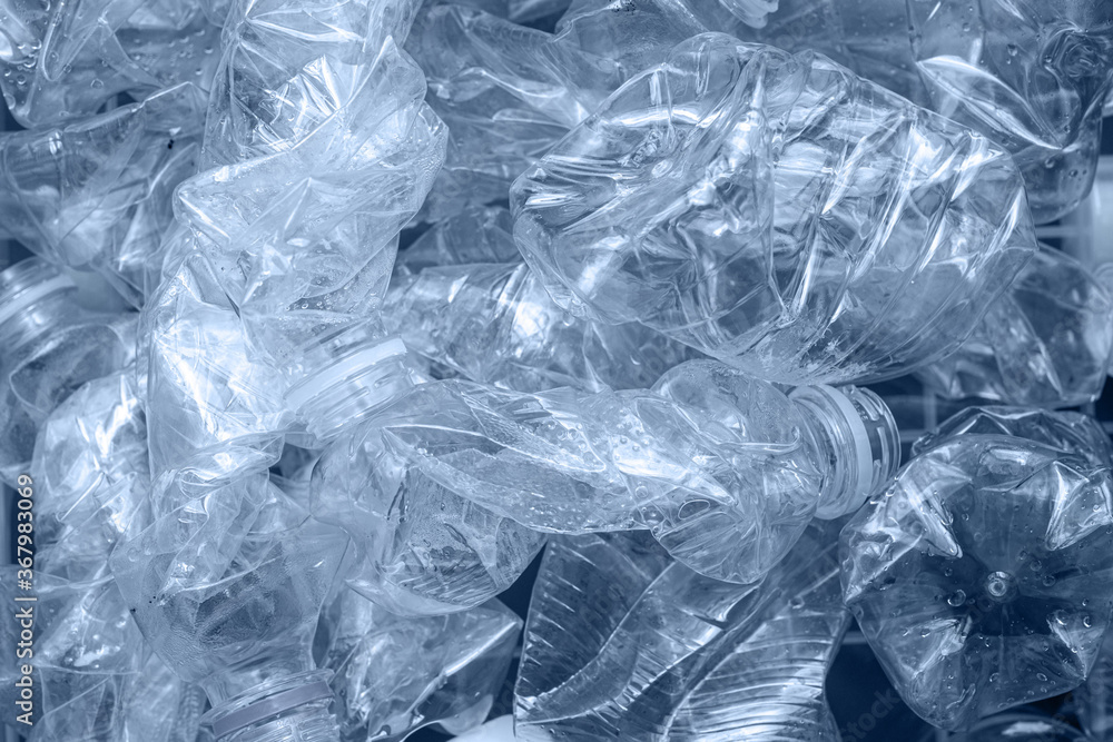 Rolled plastic bottles for recycling. Rolled plastic bottles for recycling.