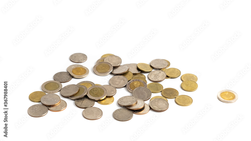 A collection of Thai baht coins on a white background. This coin is denominated in Thai baht. A collection of Thai baht coins on a white background. This coin is denominated in Thai baht.