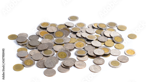 A collection of Thai  baht coins on a white background. This coin is denominated in Thai baht.