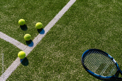 Fotografie View of empty lawn tennis court with tennis ball