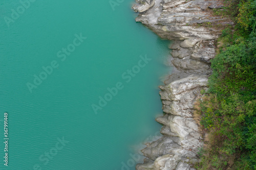 Fototapeta Naklejka Na Ścianę i Meble -  Stoned river bank aerial view.