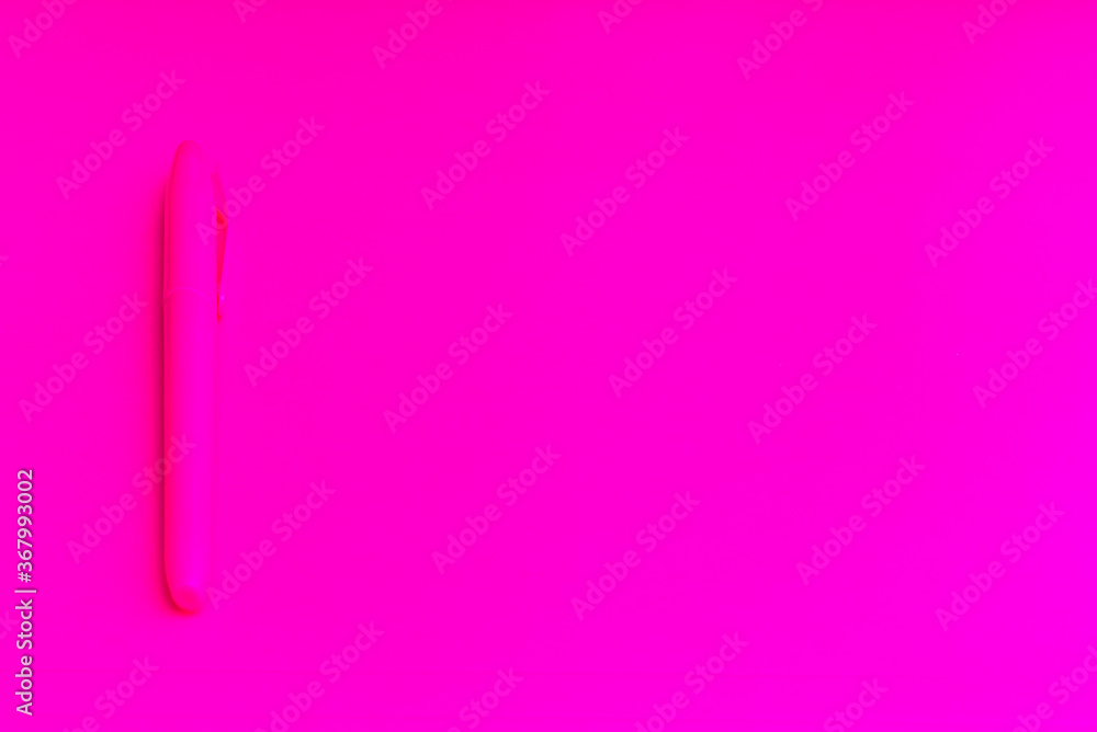 Magenta colored highlighters at magenta background with copy space Magenta colored highlighters at magenta background with copy space