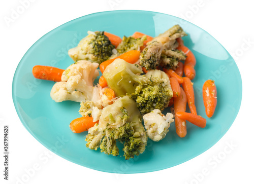 provencal vegetables on a plate.grilled vegetables on a plate isolated on white background.broccoli and carrots on a plate top view.healthy food